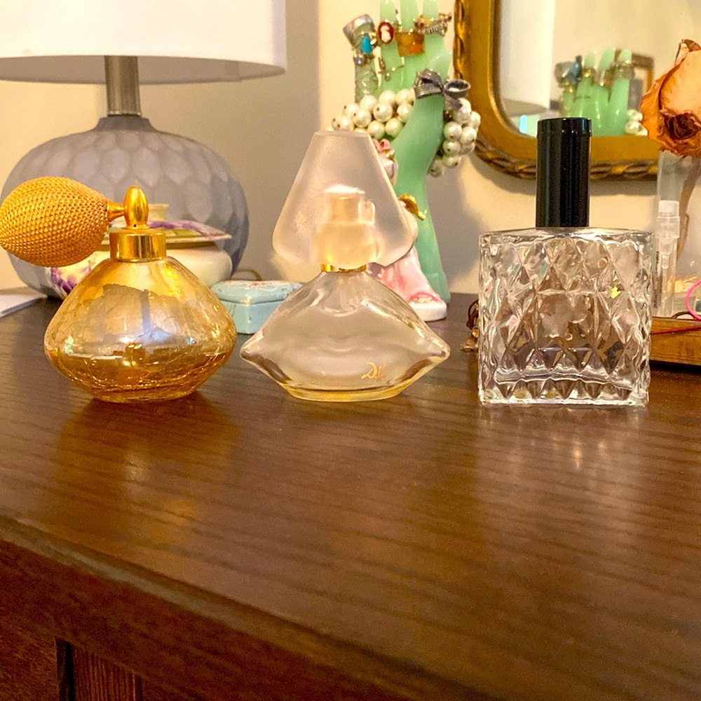 Three vintage perfume bottles